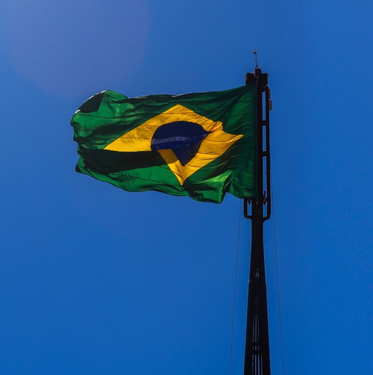 flag of brazil against the blue sky