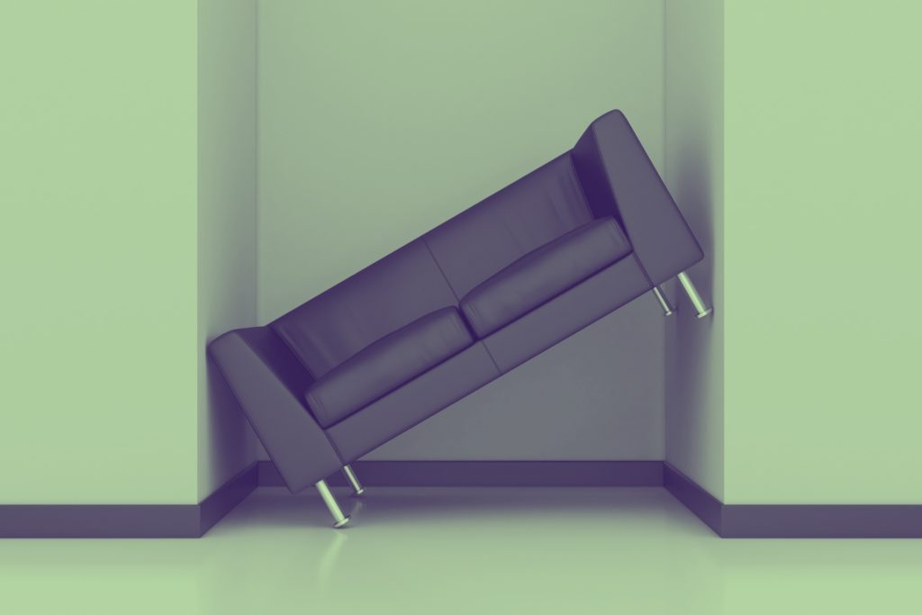 tilted sofa because it does not fit between two walls