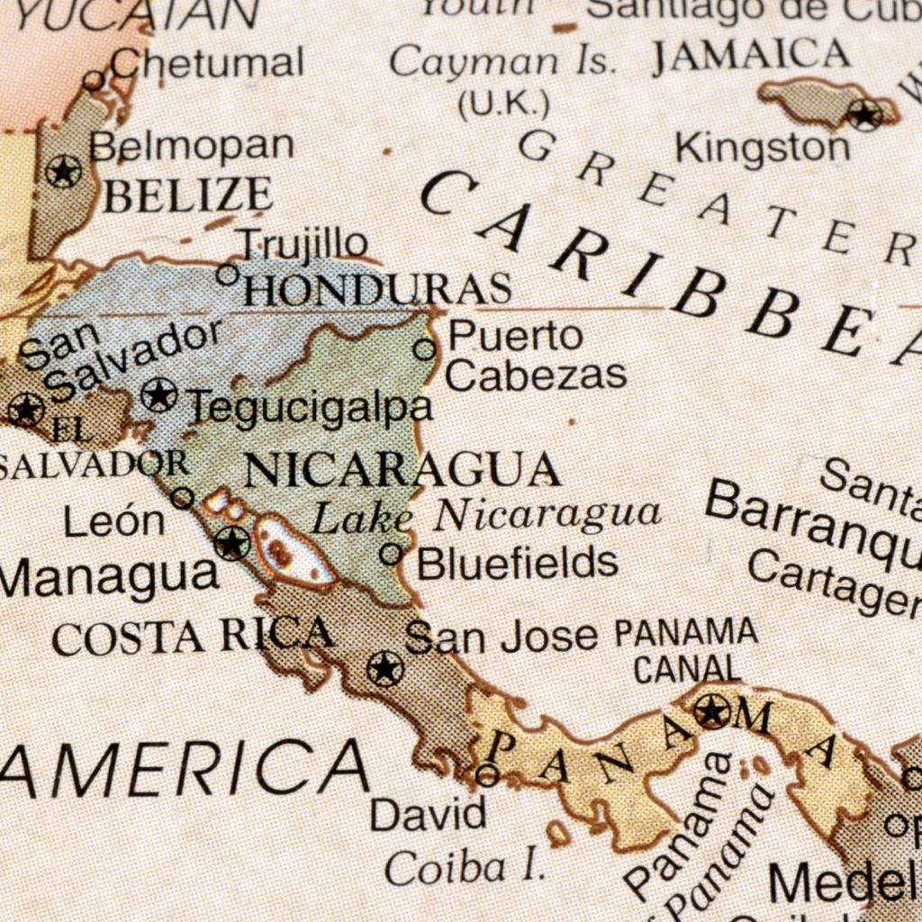 A close-up photograph of Central America from a desktop globe