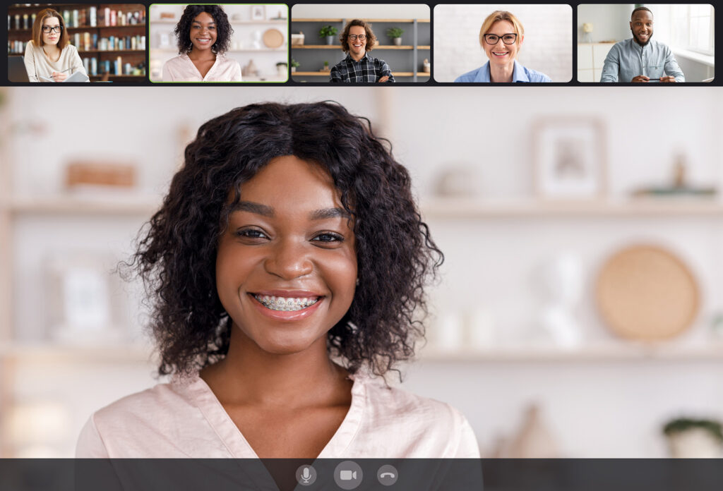 Group Chat And Remote Meeting Concept. Screen monitor interface view of happy diverse people speaking using webcam conference on computer program software. Smiling young men and women talking online
